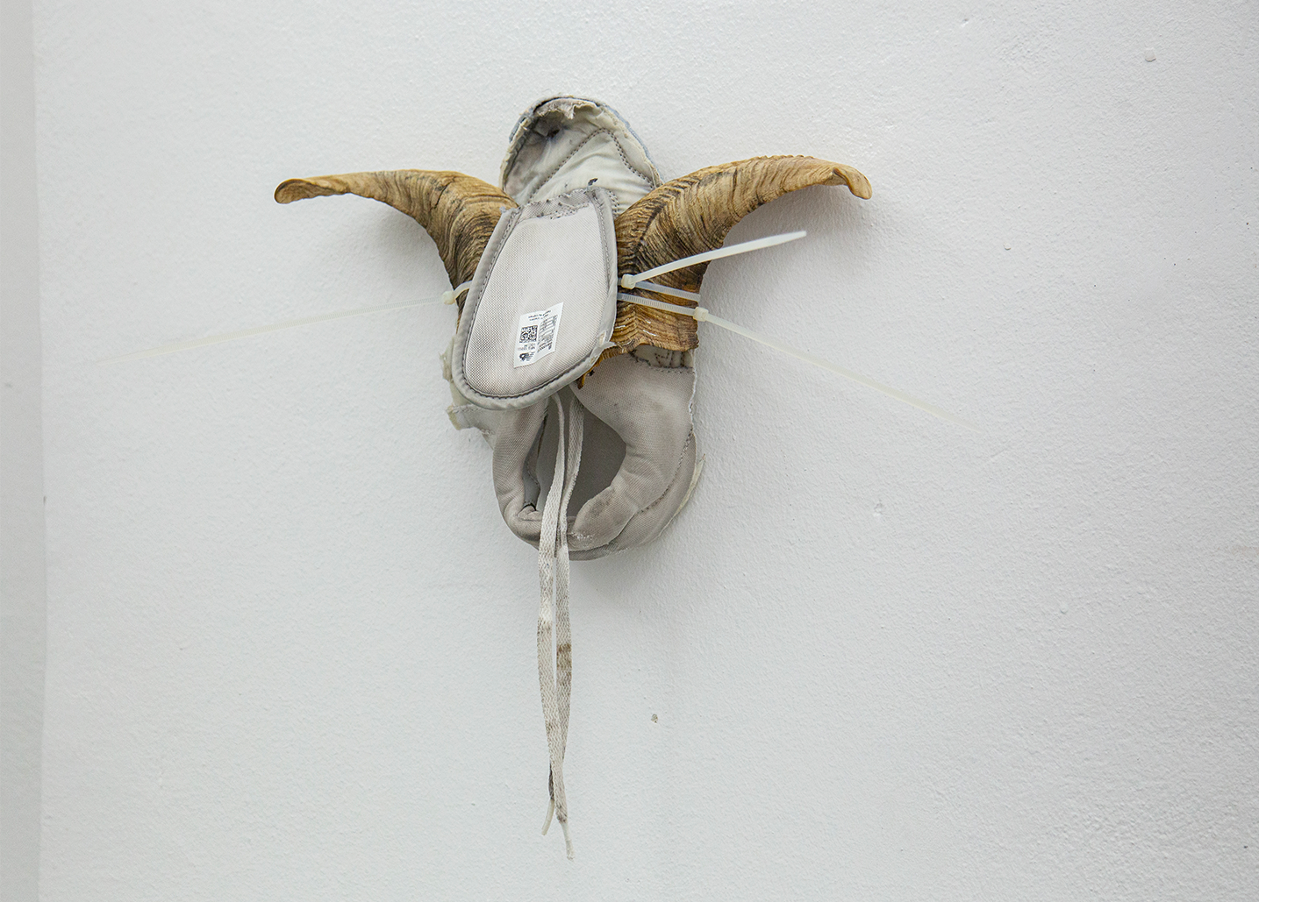 Exhibition views — Idol - Goat, Mask, 2025 mixed media, goat horns, plastic moulds, fabric, plastic tie, 30x40x10