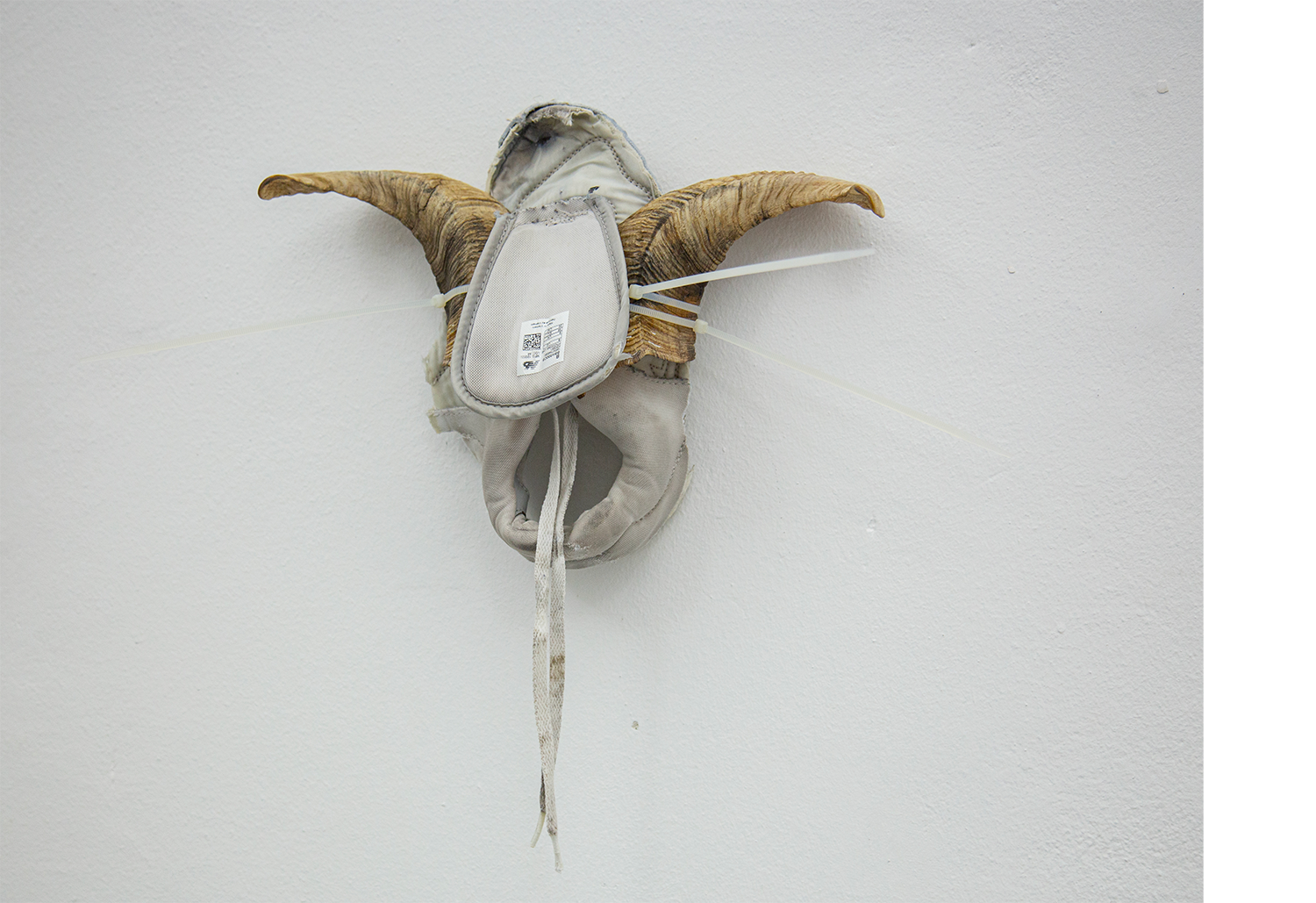 Exhibition views — Idol - Goat, Mask, 2025 mixed media, goat horns, plastic moulds, fabric, plastic tie, 30x40x10