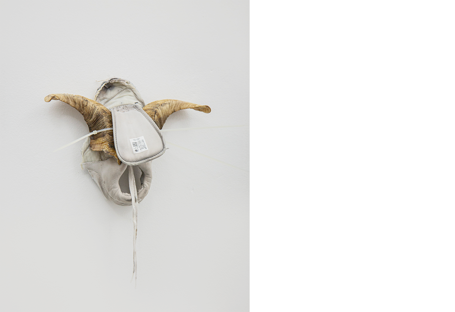 Exhibition views — Idol - Goat, Mask, 2025 mixed media, goat horns, plastic moulds, fabric, plastic tie, 30x40x10
