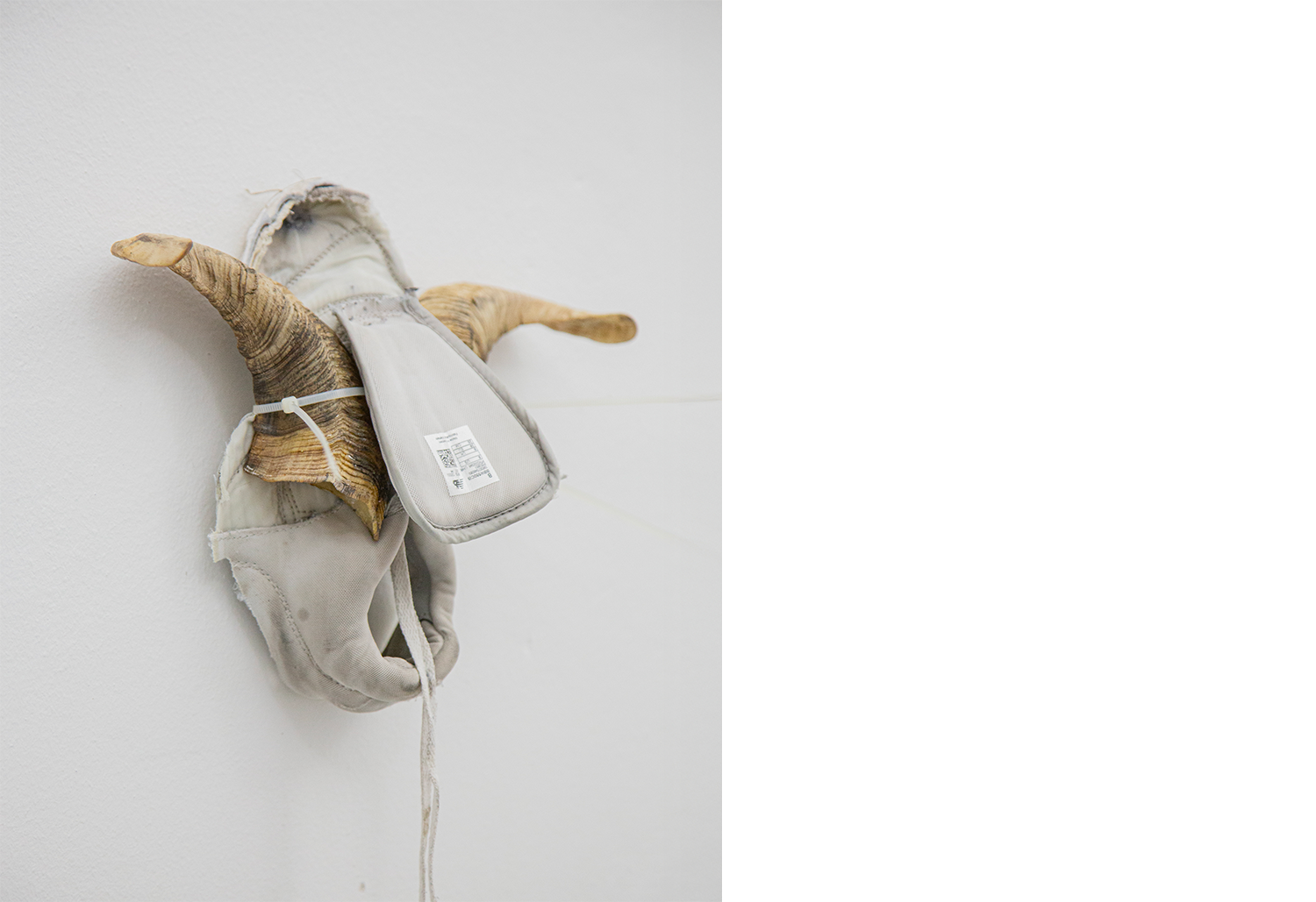 Exhibition views — Idol - Goat, Mask, 2025 mixed media, goat horns, plastic moulds, fabric, plastic tie, 30x40x10