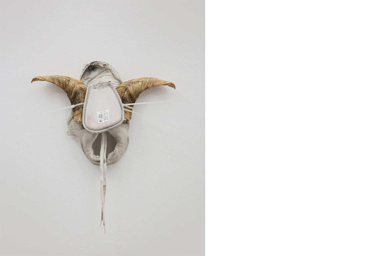 Exhibition views — Idol - Goat, Mask, 2025 mixed media, goat horns, plastic moulds, fabric, plastic tie, 30x40x10