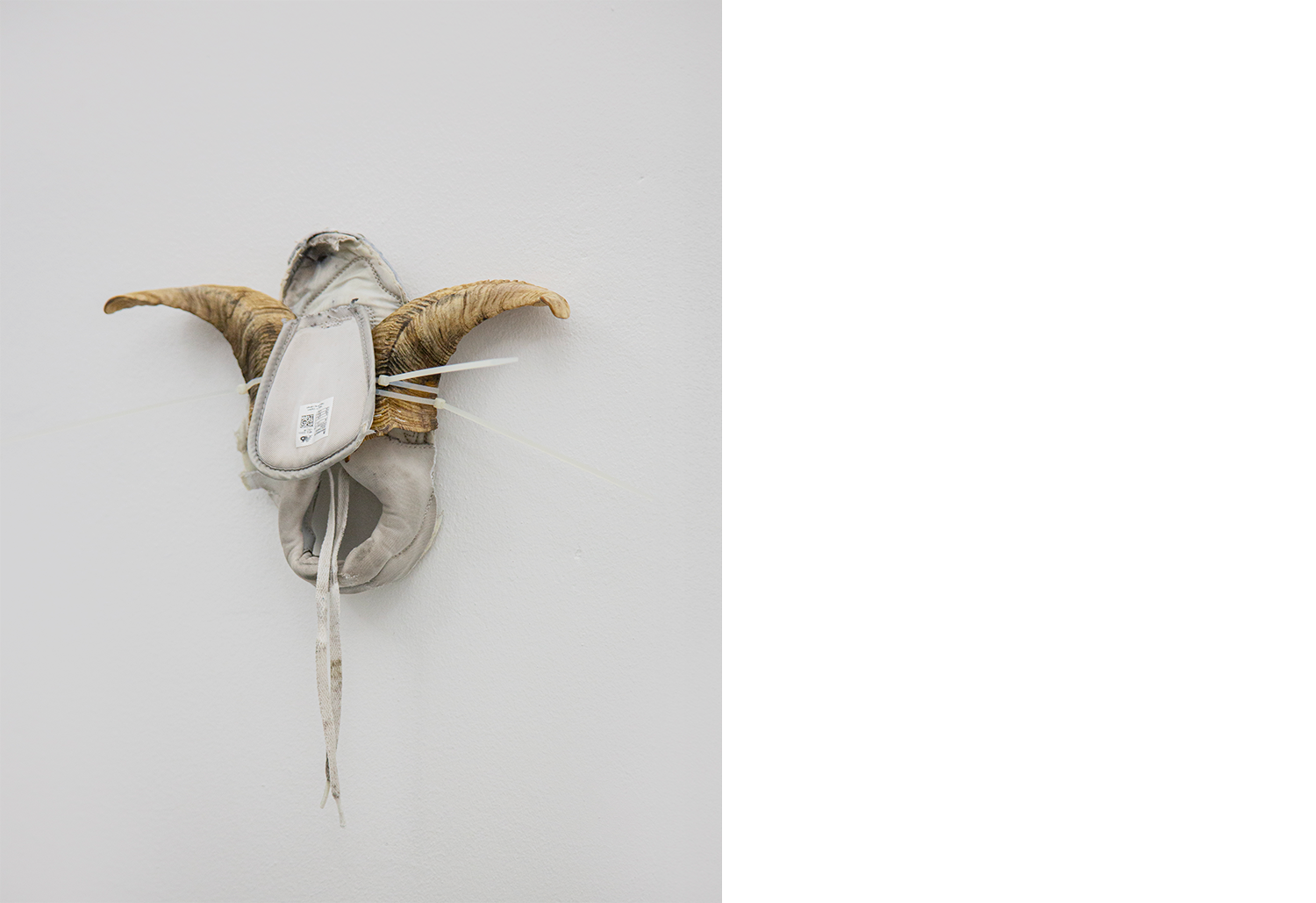 Exhibition views — Idol - Goat, Mask, 2025 mixed media, goat horns, plastic moulds, fabric, plastic tie, 30x40x10