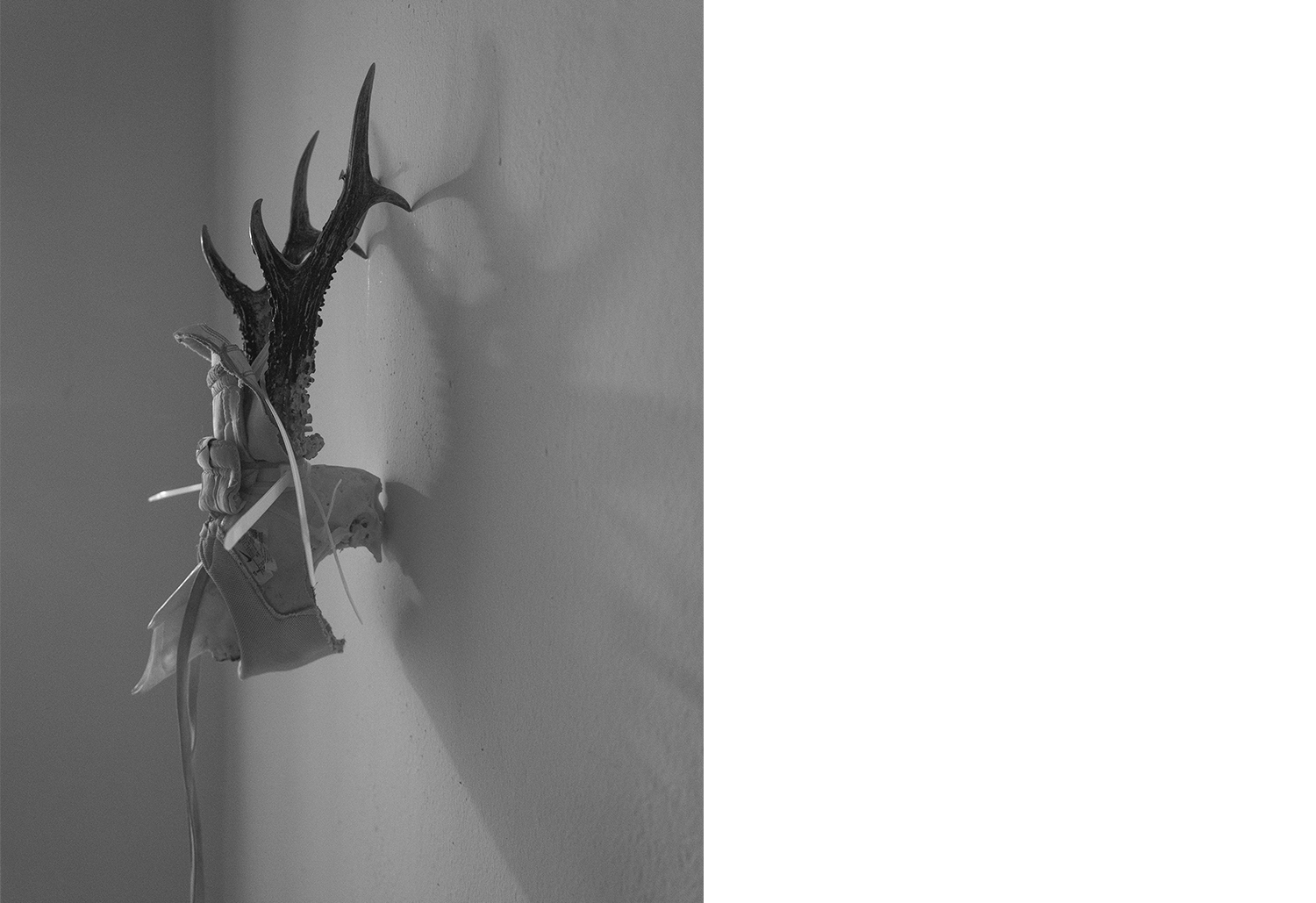 Exhibition views — Idol #6- Mask, 2025 | Mixed media, bones, metal ties, plastic sneakers. 40x30x20.